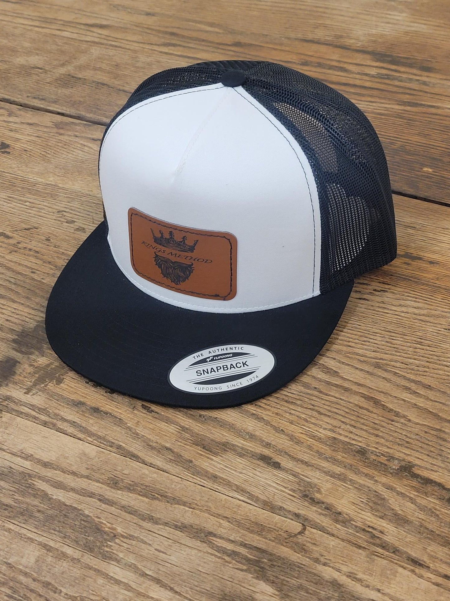 K.M. White/Black Hat/Rectangle Logo